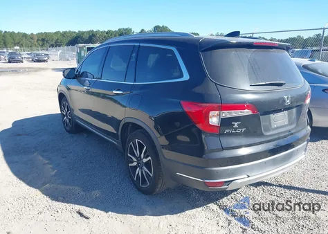 2019 Honda Pilot Touring z USA, uszkodzony, nr VIN 5FNYF5H91KB011966